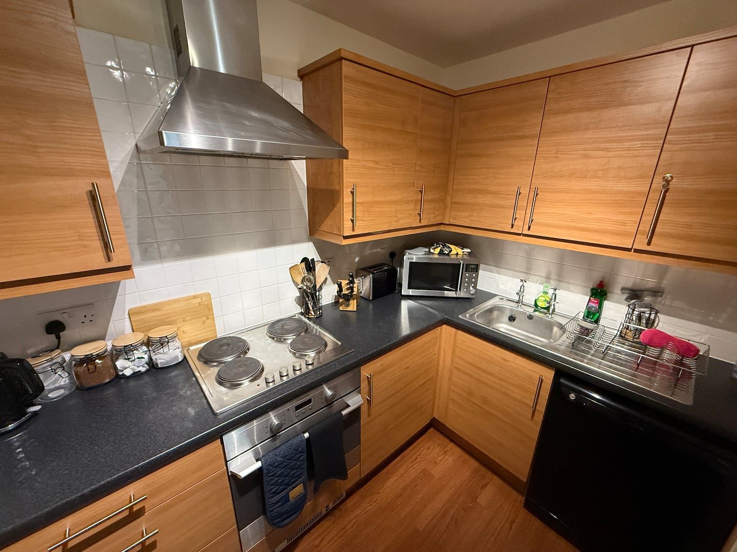 Kitchen with hob, oven and microwave